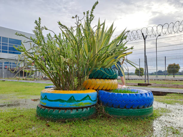 istock flower pots from used rubber car tires 1409806713