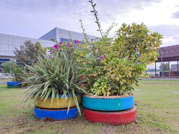 istock flower pots from used rubber car tires 1409806722