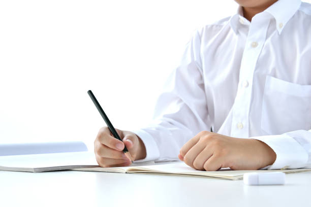 istock Child studying in living room 1409809423