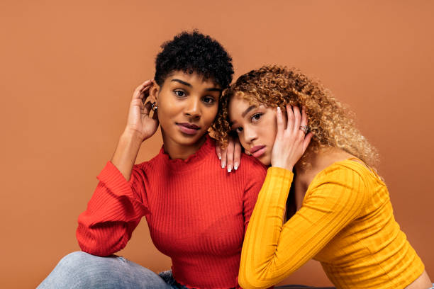 istock Pretty Afro Friends in Studio Shot 1409812343