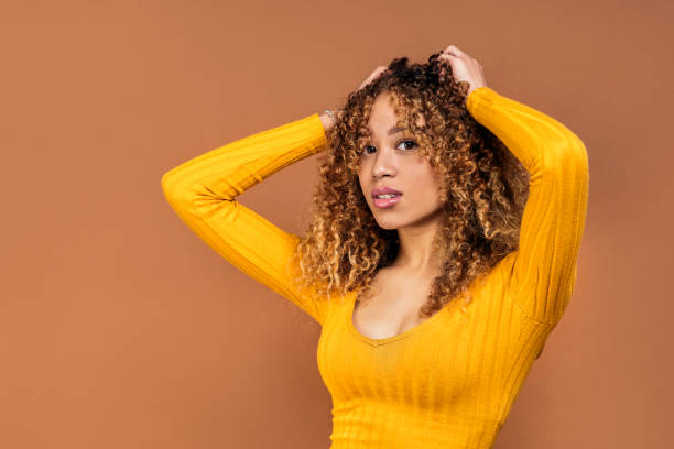 istock Beautiful Curly Haired Woman Portrait 1409812401