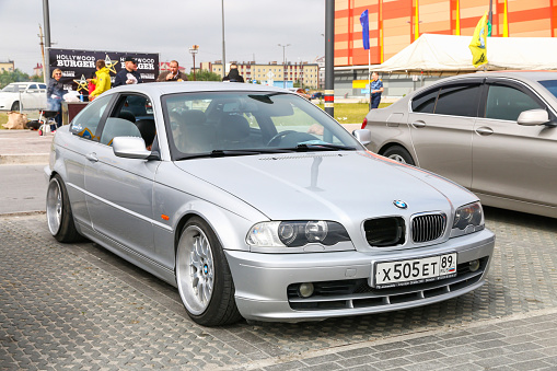 Novyy Urengoy, Russia - July 15, 2017: Grey coupe car BMW 3-series (E46) presented at the Dvijka Motor Show.