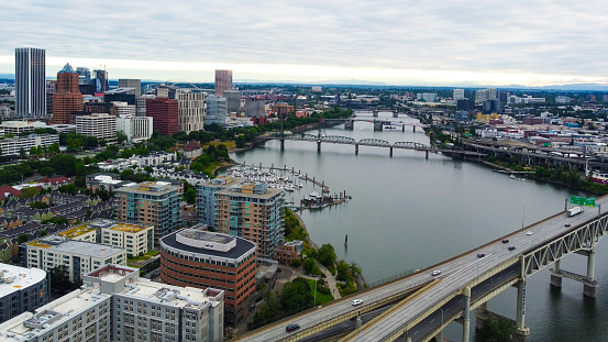 Portland, Oregon - 17-July-2022, View of Portland Downtown and Union Station from above Broadway Bridge at sunrise