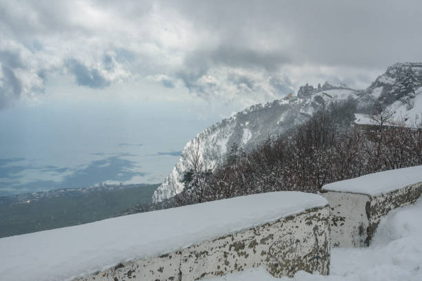 istock Road to Mount Ai-Petri after blizzard in spring. Crimea 1409817183
