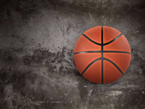 istock Basketball on isolated on old cement wall background. top view 1409820244