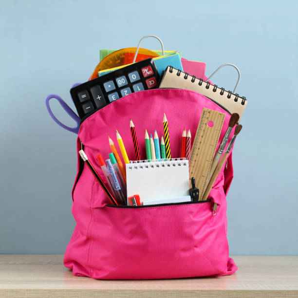 istock Pink school backpack and stationery. 1409821039
