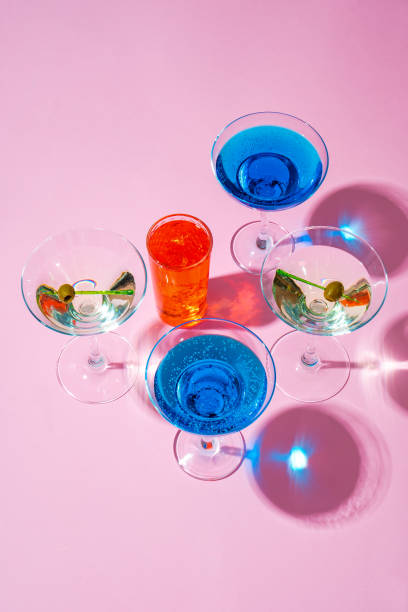 istock Cold and refreshing cocktails on color background 1409827187