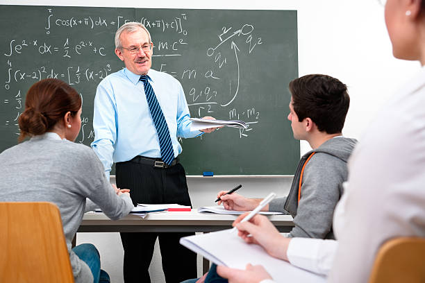 istock teacher and the  high school students 140982861