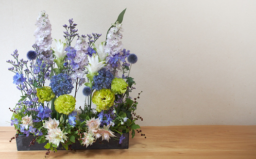 nterior with purple and green flower arrangements