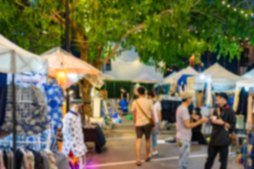 The blurry Market fair environment around shopping community and market place located in Asia.