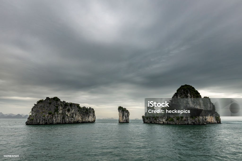 The island and rocks of the Ha Long Bay in Vietnam Aerial View Stock Photo