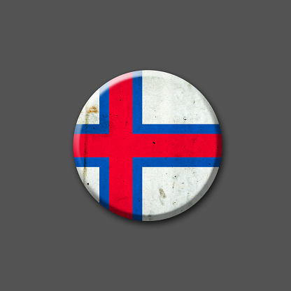 Metal, round badge, in the colors of the flag of the Faroe Islands. 3D Illustration. Isolated on a gray background. Signs and symbols. Design element.
