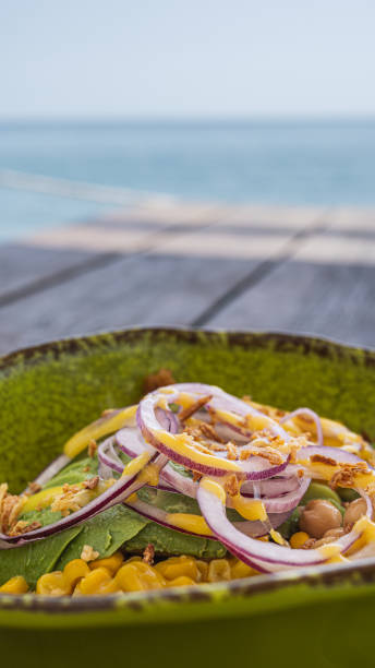 istock Mixed salad in a beach club 1409835563