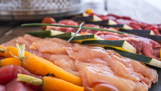 Platter of meats and vegetables for barbecue