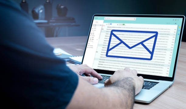 istock Businessman hand on keyboard laptop with icon E-mail on display 1409840820