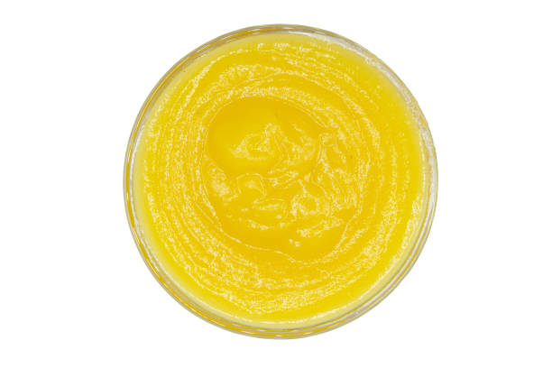 istock Applesauce in bowl isolated on white background top view 1409841723