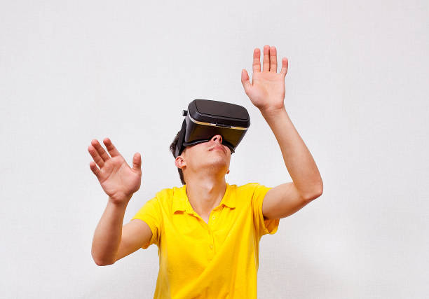 istock Young Man in VR Glasses 1409843408