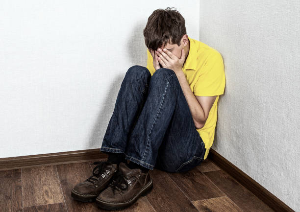 istock Sad Teenager Crying 1409843688