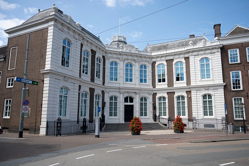 Magnificent City Hall in the heart of the Cardiff, Welsh and European flags visible.