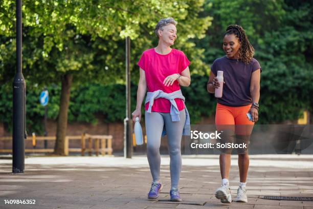 Strolling Through The City Stock Photo - Download Image Now - Walking, Exercising, Healthy Lifestyle