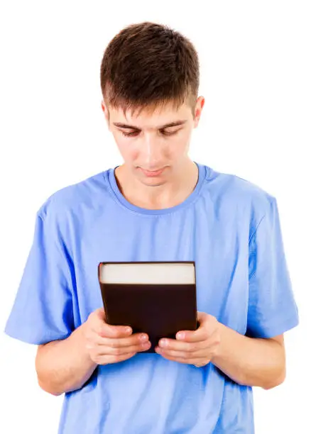 Young Man with a Book Isolated on the White Background