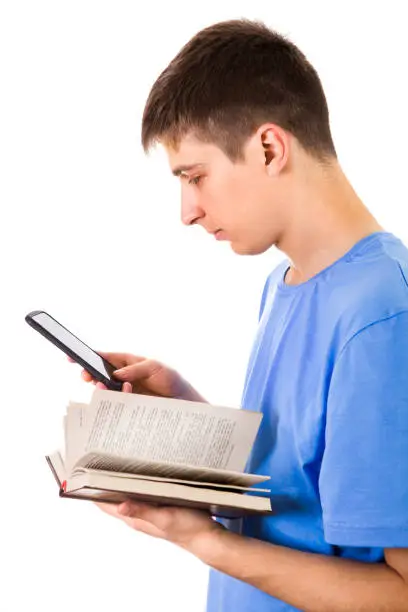 Young Man with a Book and Mobile Phone Isolated on the White Background