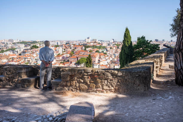Lisbon, Portugal - November 7, 2014: Ancient Sao Jorge Castle in Lisbon, Portugal. Since the 12th century, the castle has variously served as a royal palace, a military barracks, now as a national monument and museum