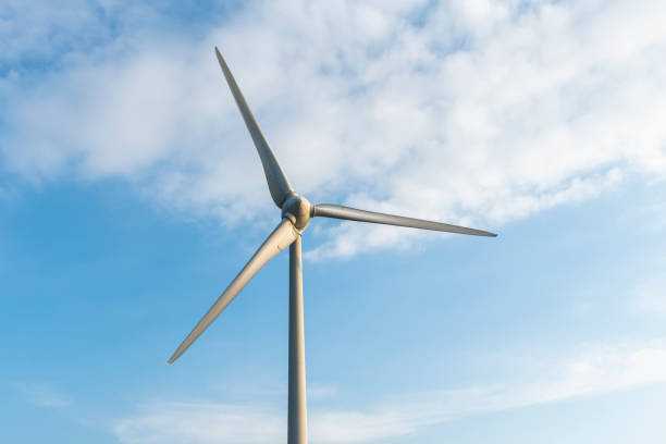 istock Close-up of windmills group with sky background 1409852145
