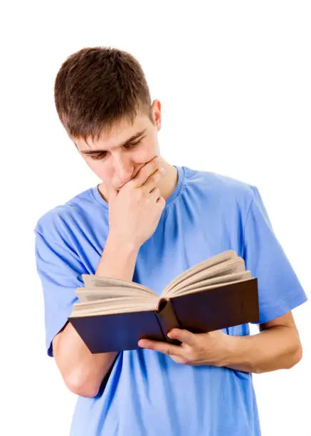 Young Man read a Book Isolated on the White Background