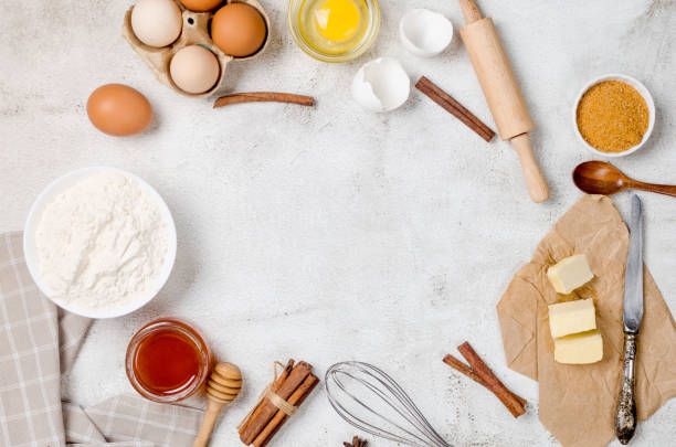 istock Ingredients for making dough dishes: cakes, cookies, muffins, pies on a gray background. 1409856301