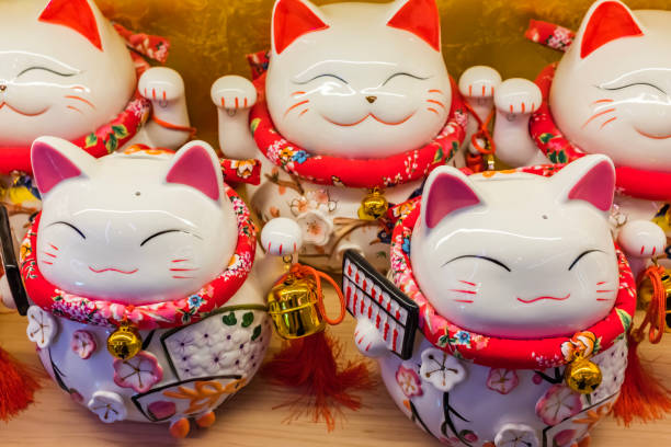 istock Maneki Neko, cute lucky cat 1409857829