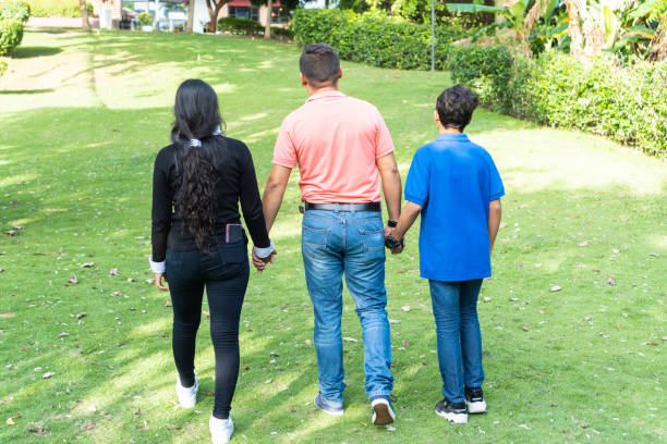 istock Father With His Two Children 1409861217