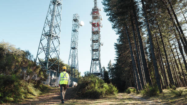 istock Telecommunications engineer turns to the radio antennas 1409863673