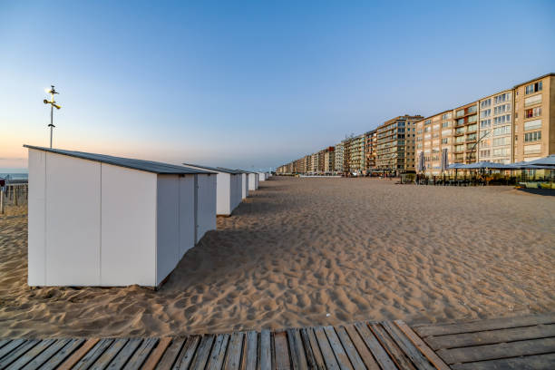 istock Boardwalk and Beach Huts at De Panne in Belgium 1409864458