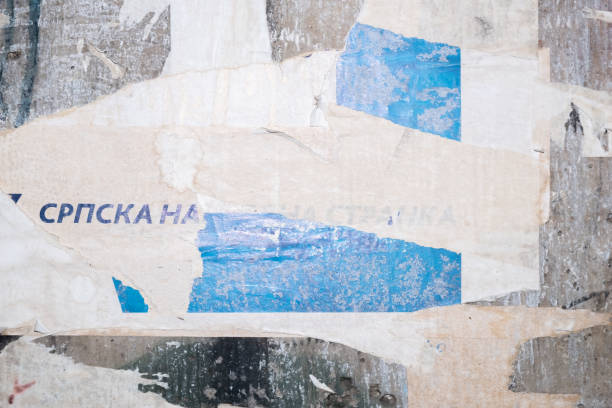istock Torn street poster background with text. Abstract and ripped weathered paper collage 1409866351