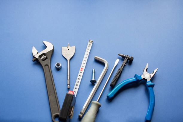 istock pliers and hexagon on colorful background, copy space 1409867246