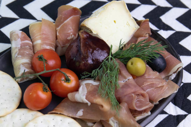 istock Cold Cut Platter, Cheese , Ham and  Preserved  Olives 1409867702