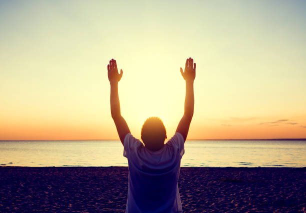 istock Happy Person Praying 1409868004