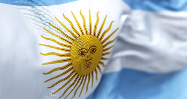 Close-up view of the national flag of the Argentine Republic Close-up view of the national flag of the Argentine Republic. South American country. Horizontal triband of light blue (top and bottom) and white with a Sun of May centered on the white band. argentinian culture stock pictures, royalty-free photos & images