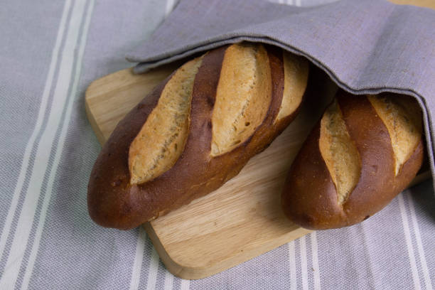istock Close up Plain Laugen Bread on White Background 1409869418
