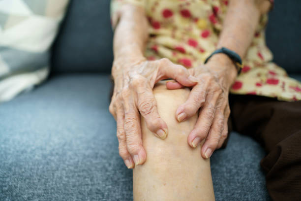 istock Elder woman hurt at knee. 1409869715