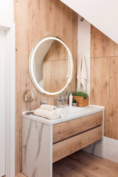 istock Modern bathroom interior with stylish mirror and vessel sink 1409870648