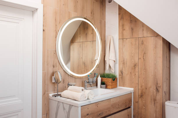 istock Modern bathroom interior with stylish mirror and vessel sink 1409870672