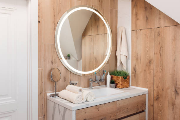 istock Modern bathroom interior with stylish mirror and vessel sink 1409870689
