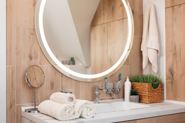 istock Modern bathroom interior with stylish mirror and vessel sink 1409870704
