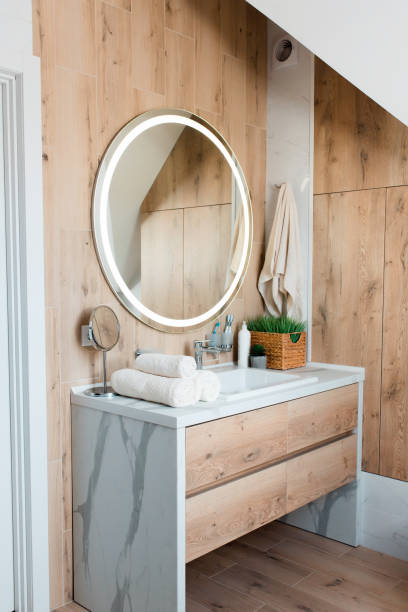 istock Modern bathroom interior with stylish mirror and vessel sink 1409870720