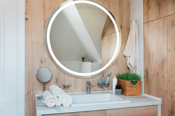 istock Modern bathroom interior with stylish mirror and vessel sink 1409870782