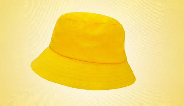 istock bucket hat on light yellow background 1409871645