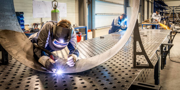 Connecting metal material by welding technology stock photo