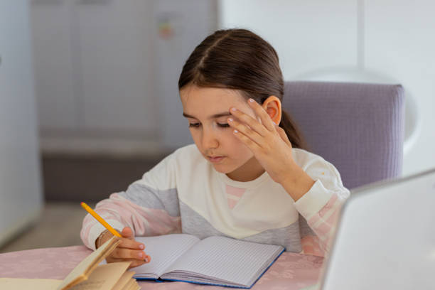 istock School Girl learning about educational subject, preparing himself for the exam 1409874814
